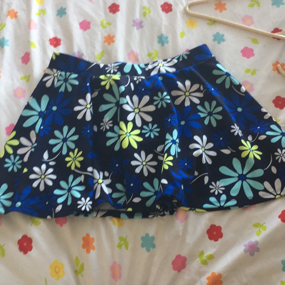 Justice blue,white,turquoise and neon flower skirt